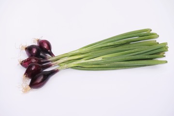 Fresh organic onions on white background