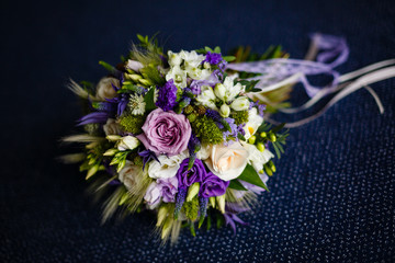 Purple and pink rose bridal bouquet