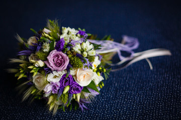 Purple and pink rose bridal bouquet