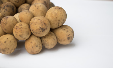 Lansium parasiticum asian fruits background 