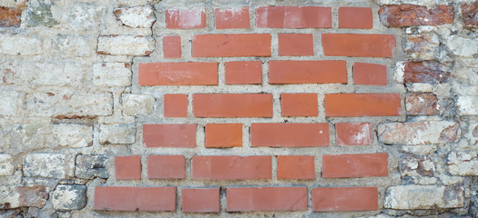 Vintage red bricklaying wall fragment texture background