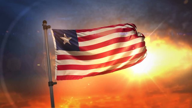 Liberia Flag Backlit At Beautiful Sunrise Loop Slow Motion 4K