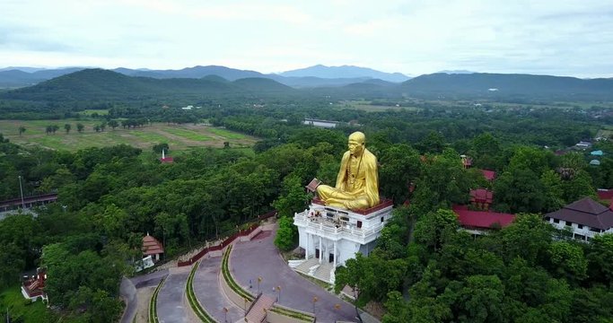 Aerial view, Kruba Srivichai statue at Wat Doi Ti  the old history temple in Lumphun, Thailand.
