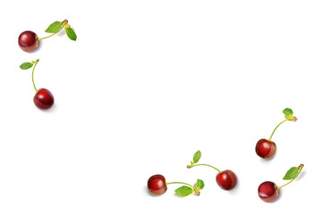 Cherry. Background with ripe red sweet cherry berries on white. Top view