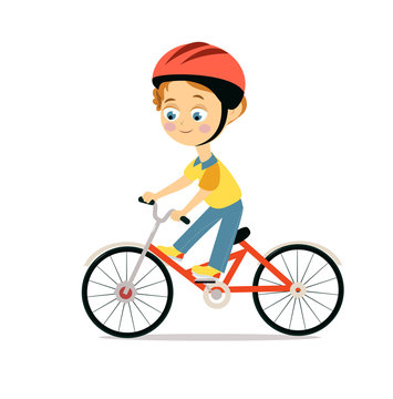 Happy little boy in helmet riding bicycle