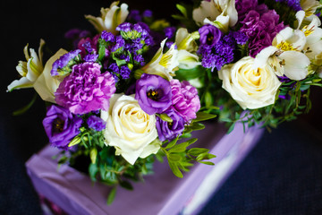 Purple and pink rose bridal bouquet