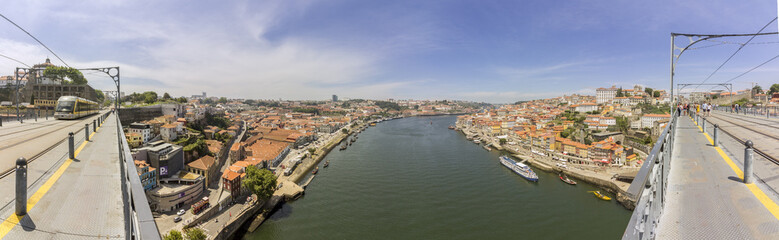 Fototapeta na wymiar Panoramic view of Porto Ribeira cityscape from top of Luis I Bridge