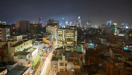 Pham Ngu Lao, backpaper street, in Saigon at night from a rooftop. Ho-Chi-Minh-City at night.