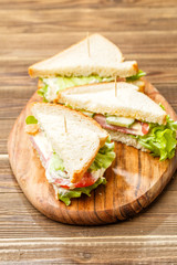 Sandwiches with toothpicks and vegetables