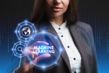 The concept of business, technology, the Internet and the network. A young entrepreneur working on a virtual screen of the future and sees the inscription: Machine learning