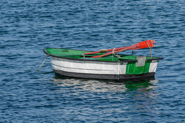 Naklejka na ściany i meble wooden fishing boat moored