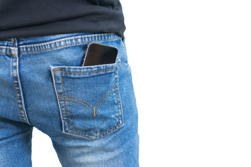 Black smartphone in the right back pocket of jeans isolated on white background with clipping mask.