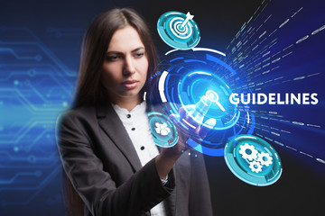 The concept of business, technology, the Internet and the network. A young entrepreneur working on a virtual screen of the future and sees the inscription: Guidelines