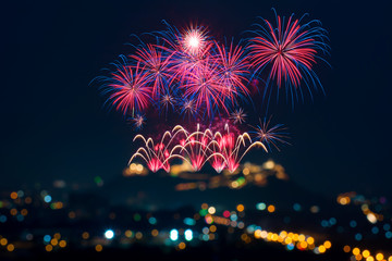 Beautiful firework display on celebration night, showing on the river    