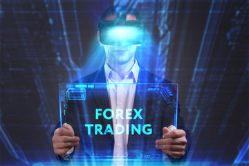 Business, Technology, Internet and network concept. Young businessman working in virtual reality glasses sees the inscription: Forex trading