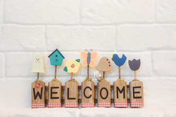 welcome text on the wall background and copy space © aboutnuylove
