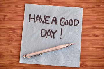 Have a good day! Handwriting on a napkin