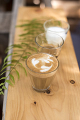 The ingredients of coffee on a wooden desk