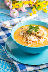 Tomato soup with rice.