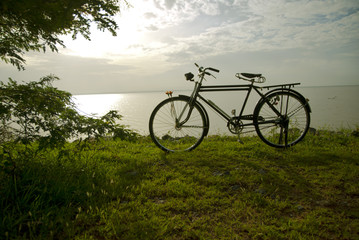 Fototapeta na wymiar Old bike in Thailand, old bike in dam
