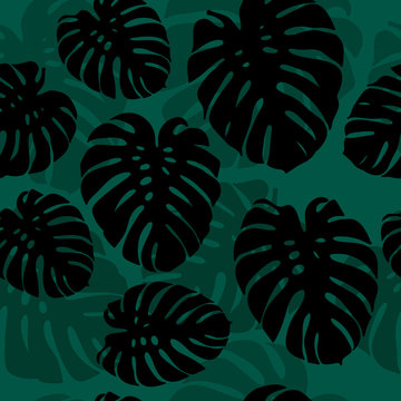 Seamless monstera palm leaves silhouettes pattern for your summer design. Vector tropical illustration