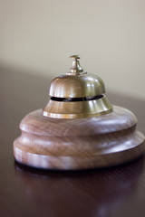 Service bell in a hotel reception for concierge alarm on desk.