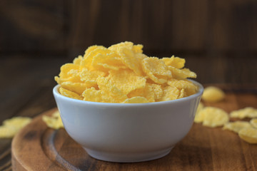 Corn flakes in bowl - cereal breakfast.