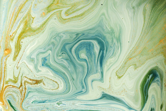 Marbled green abstract background. Liquid marble pattern