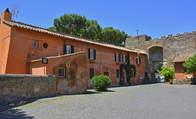 Fototapeta na wymiar Buildings in the old village or borgo of Ostia Antica near Rome, Italy 