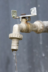 From the old tap water flows