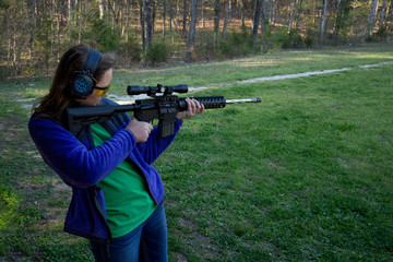 Teenage girl at shooting range