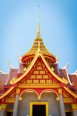 Fototapeta premium Part of Thai temple roof with blue sky background