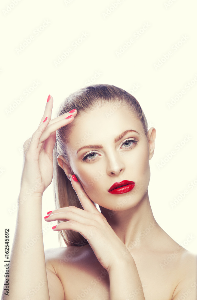 Wall mural Beauty portrait of woman with bright make-up and hands near face