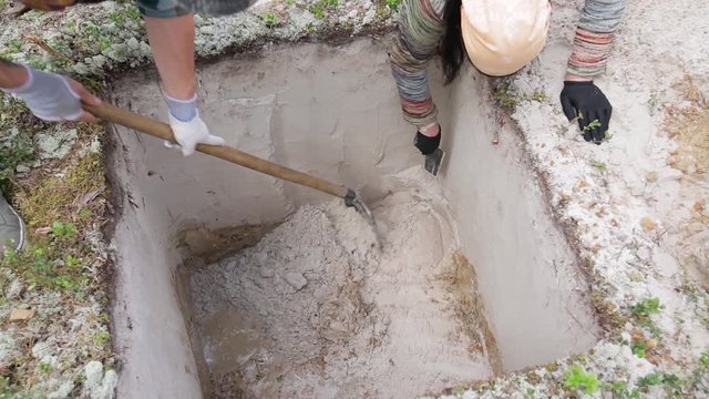 Stage of archaeological work - fine cleaning of the excavation wall