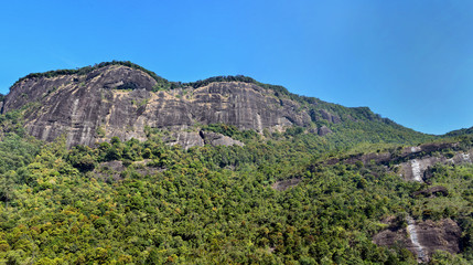 Fototapeta na wymiar Beautiful panoramic view of the mountains on the way to Adam's Peak (Sri Pada Mountain), Sri Lanka