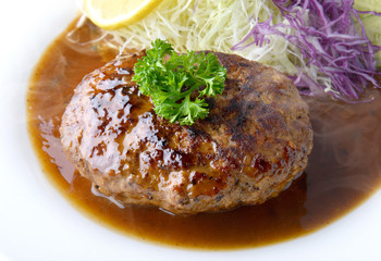 Japanese style hamberger or hamberg serve with gravy sauce.