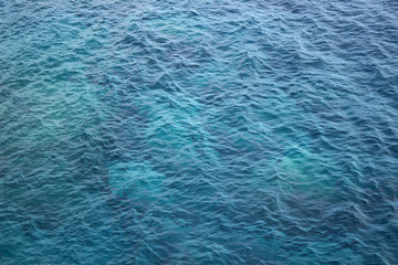 Fototapeta premium blue water, a sea under sun rays background