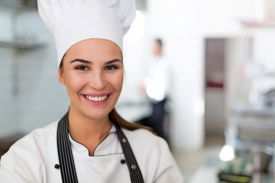 Female chef in kitchen
