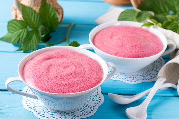Sweet berry mousse in a white bowl