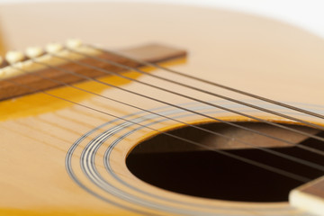 Fototapeta premium detail of classic guitar with shallow depth of field