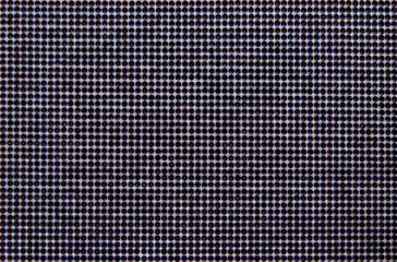 Canvas of black rhinestones. Bokeh background.