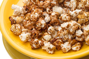 Popcorn on a yellow plate