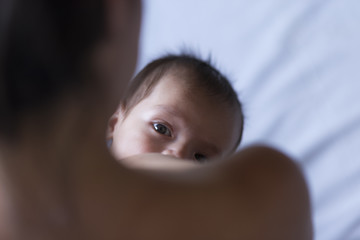 Mother breastfeeding a baby