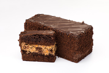 Brown cake with cream filling with fruit and chocolate