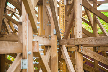 Fototapeta na wymiar Fixing roller coaster made of wood
