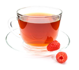 Cup of tea with raspberry isolated