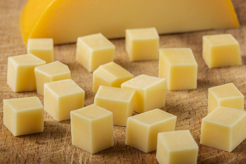 Close up of cubes of yellow cheese