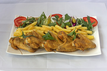 Pouletflügeli Teller