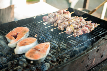 Garden party, grill-mix 3 juicy piece of steak from fish and 6 shish kebabs, on coals,