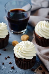 Chocolate cupcakes with ricotta cream frosting